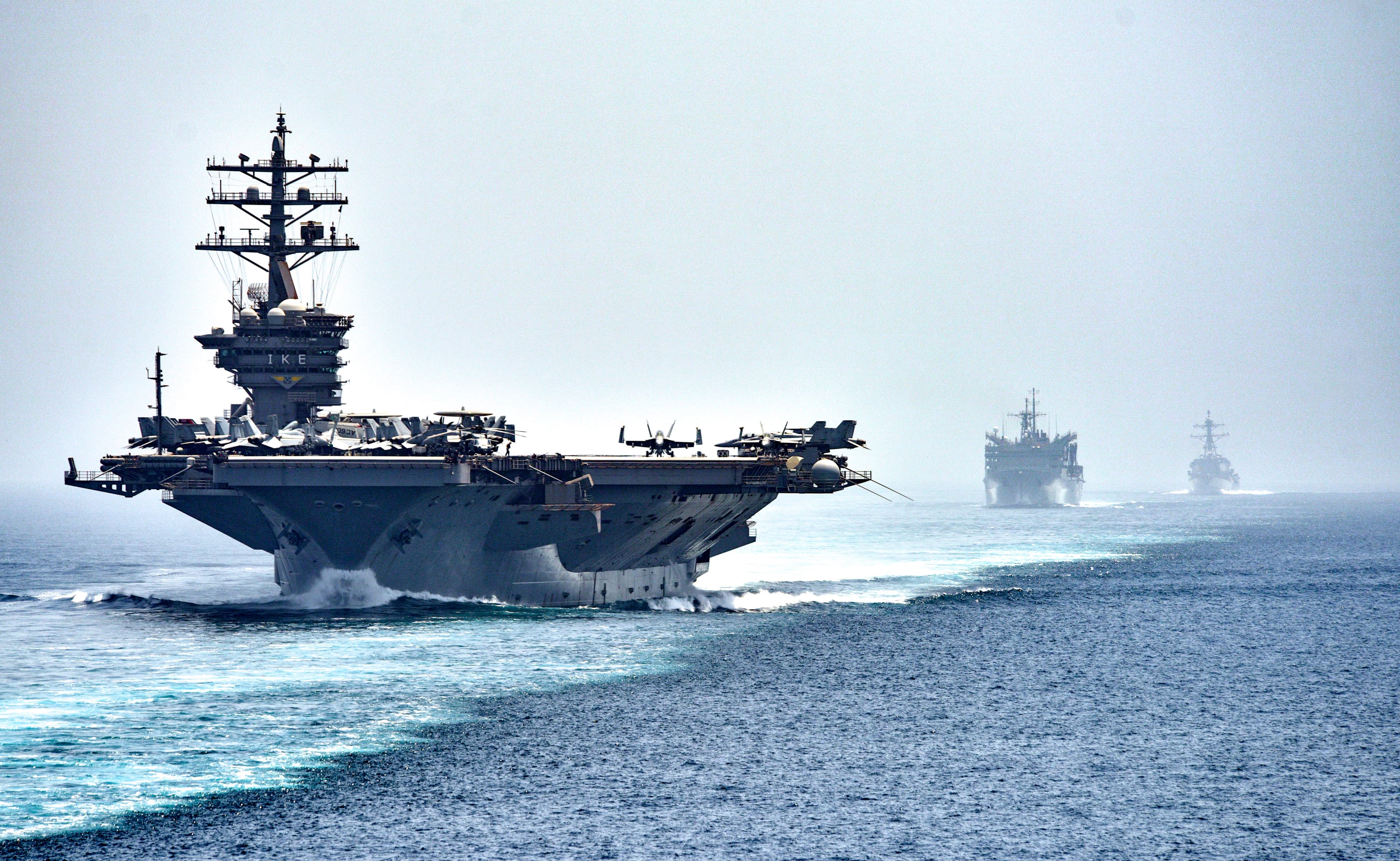 CVN 69 transits the Strait of Hormuz (28465403076)